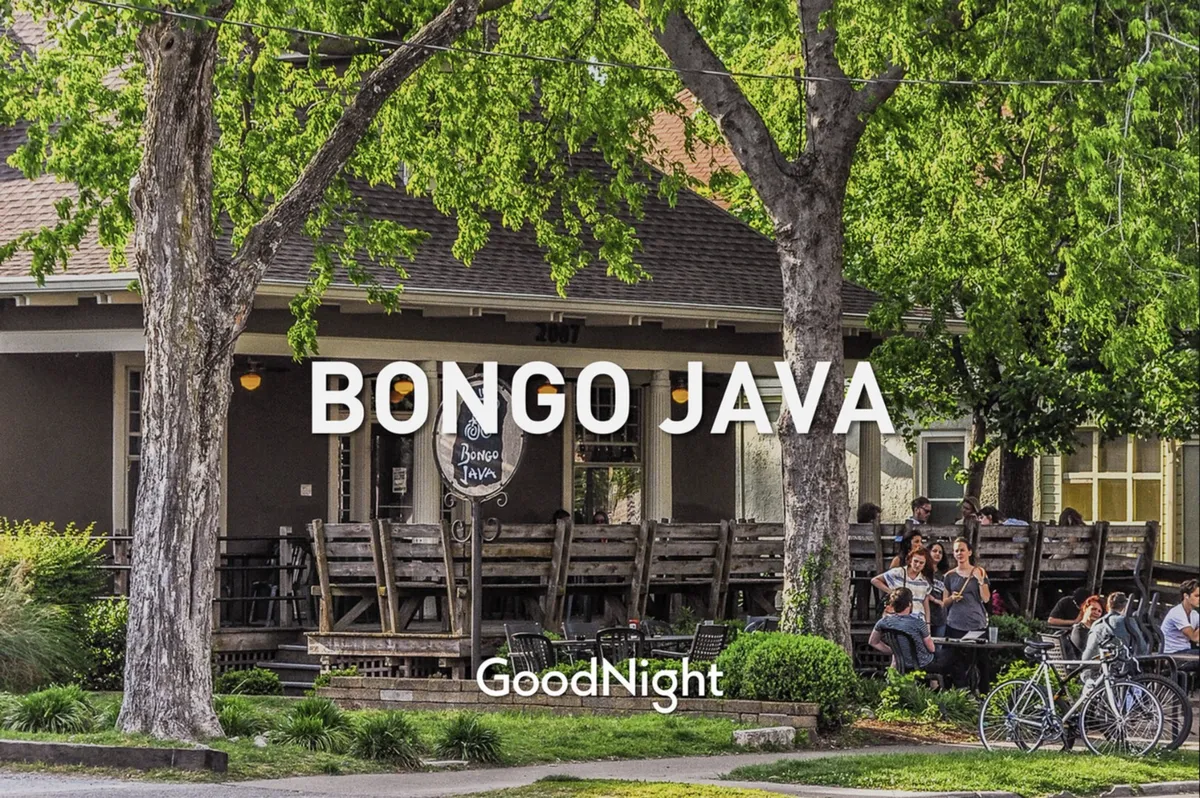 This photo shows the iconic Bongo Java sign, outdoor seating brimming with people enjoying coffee and conversation, and bikes parked nearby. The atmosphere is casual and welcoming, ideal for group lunches or informal team gatherings at a local café.